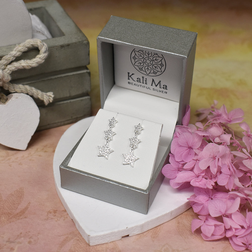 Natalie triple CZ-set star drop earrings