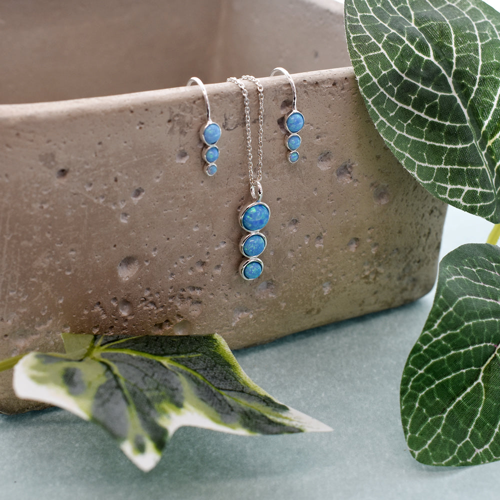 Angelica decreasing blue opalique circles pendant