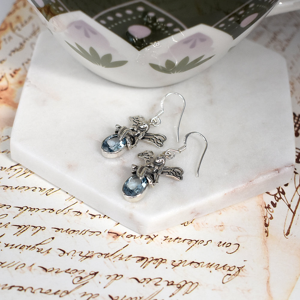 Oval blue topaz facet fairy earrings