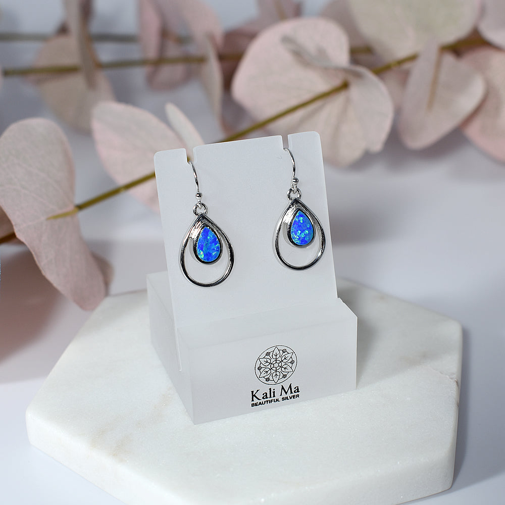 Antoinette teardrop blue opalique wire surround earrings