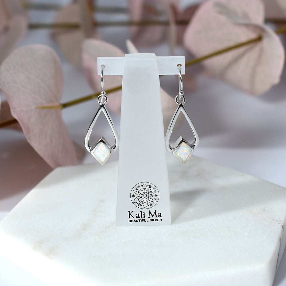 Celeste diamond looped white opal earrings