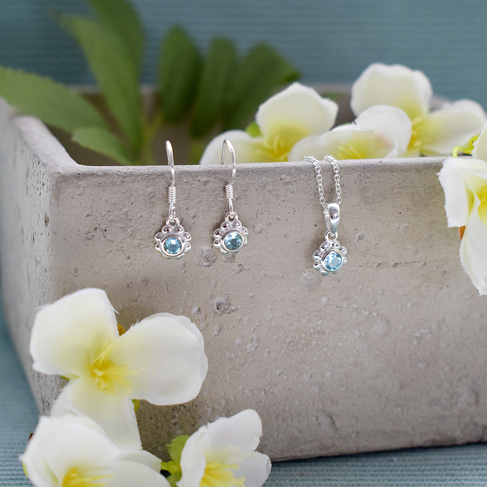 Matilda blue topaz petal earrings