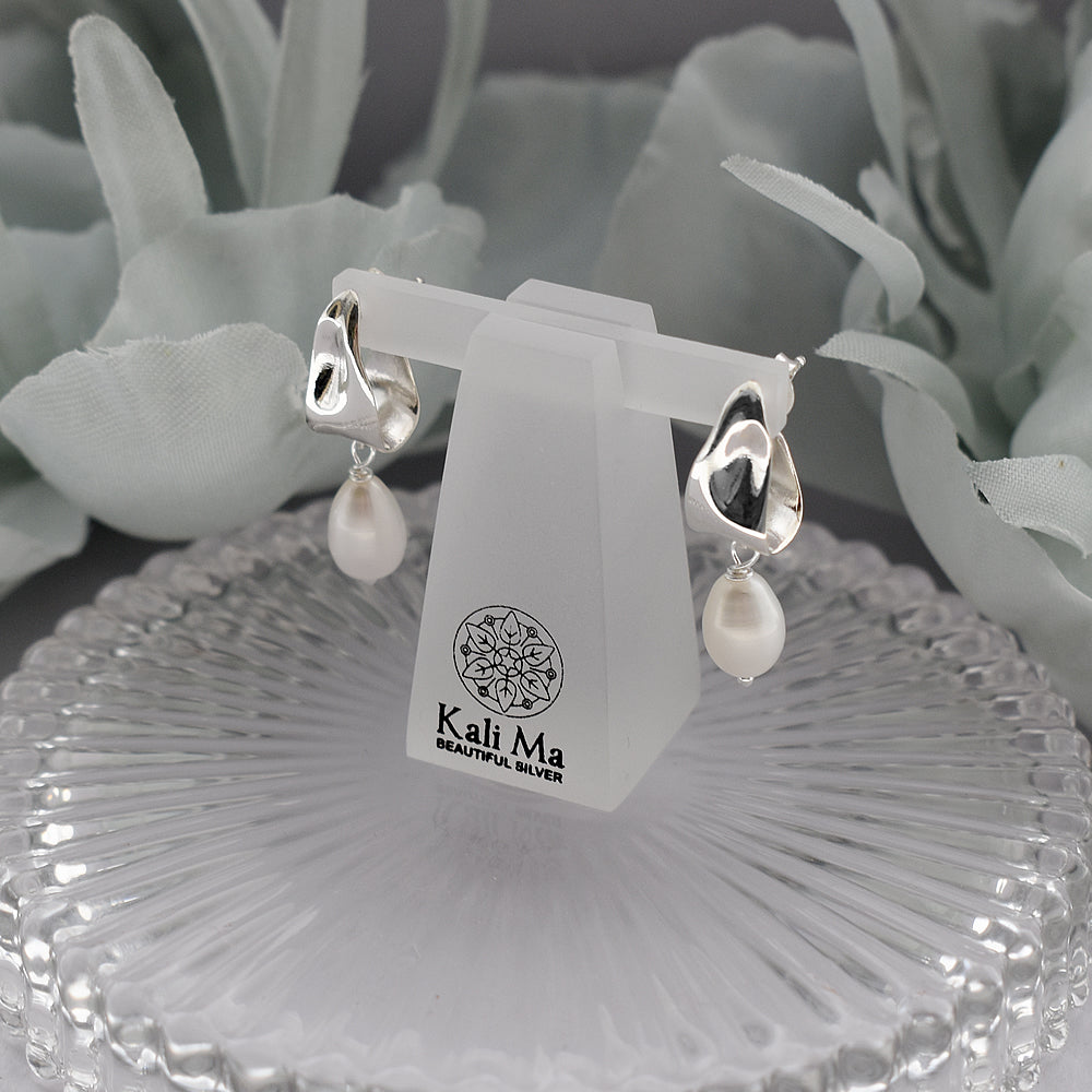 Astrid fluid silver pearl drop earrings