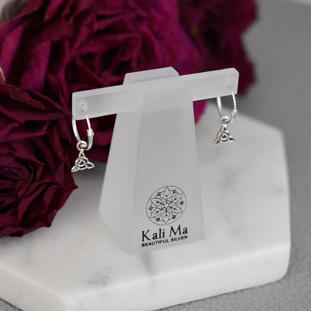 Smile hoop earrings with Celtic charm