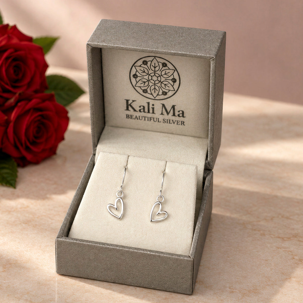 Lily offset heart earrings