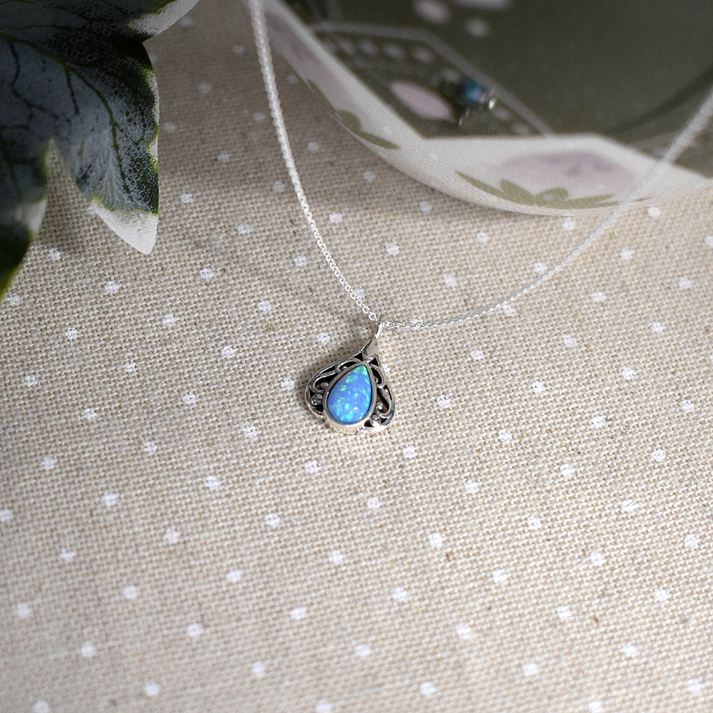 Sabrina teardrop blue opalique oxidised frame necklace