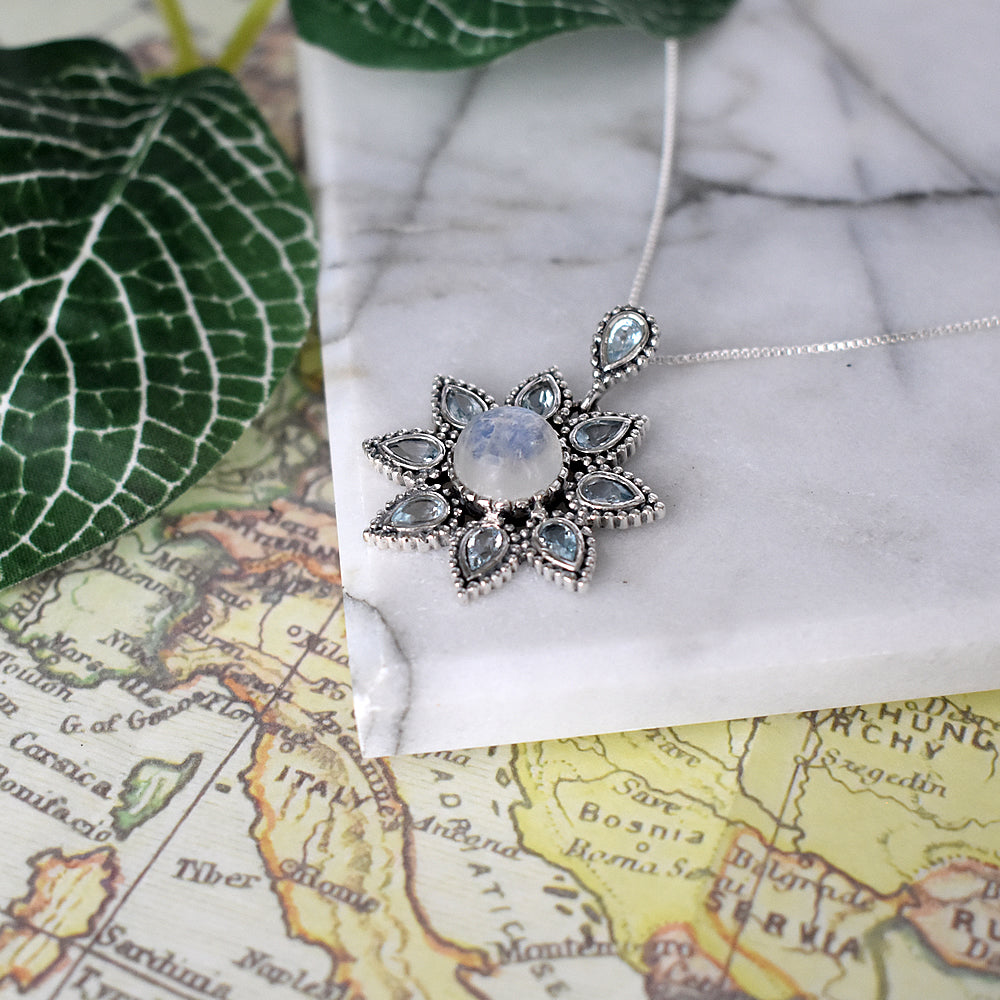 Isla rainbow moonstone and blue topaz vintage flower pendant