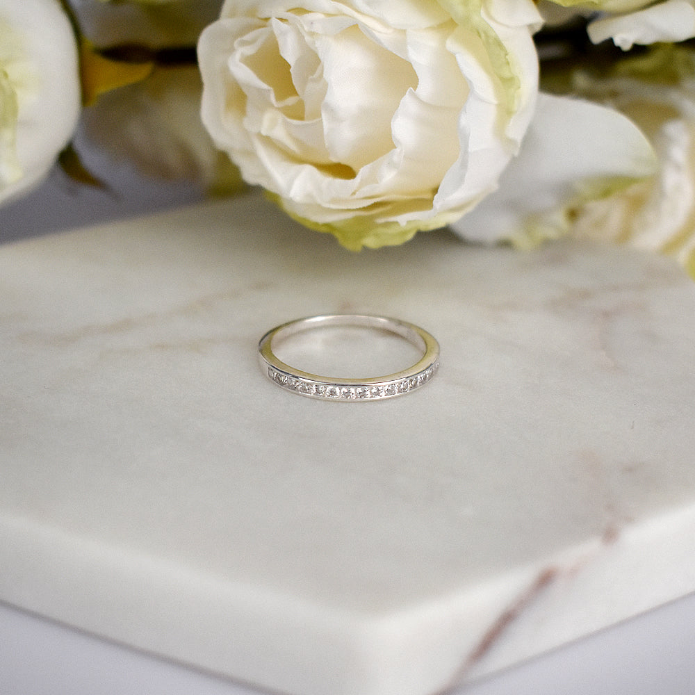 Carrie fine channel-set CZ half eternity ring