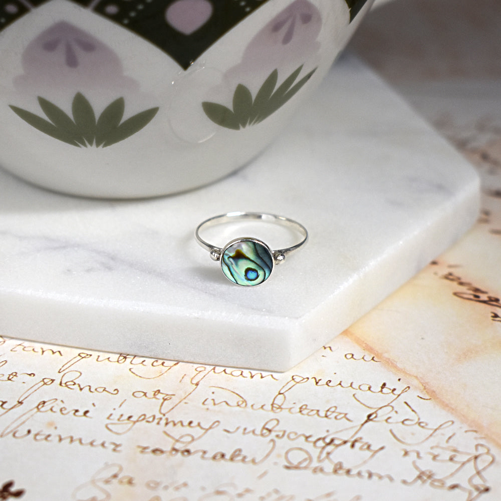 Bronwen round paua shell with ball detail ring
