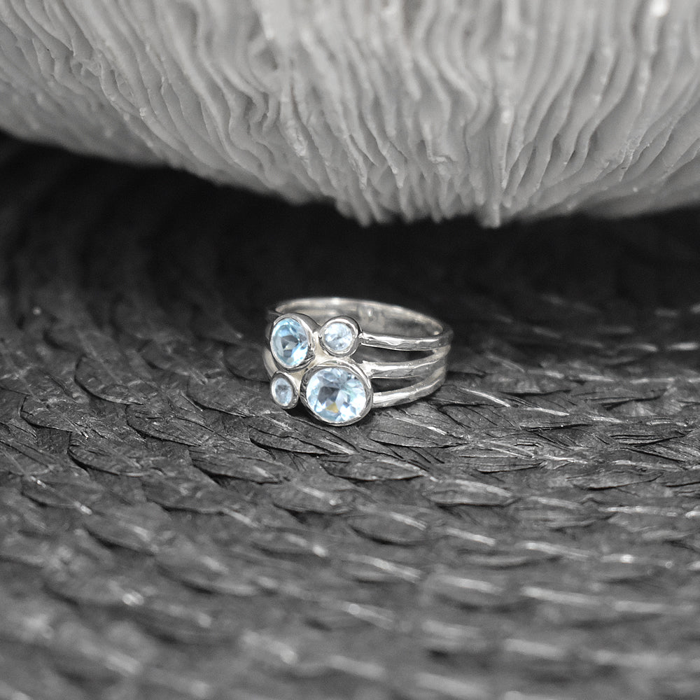Ivy four blue topaz split band ring