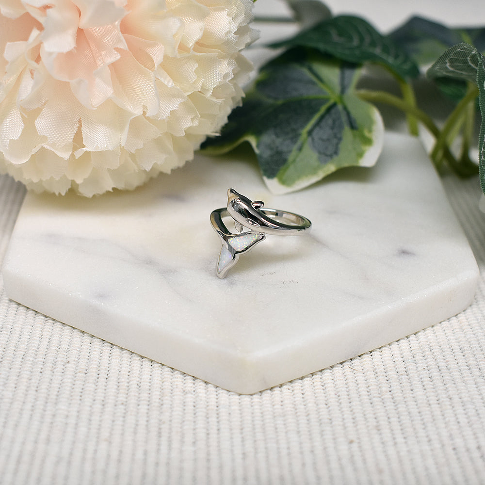 Ana overlapped white opalique dolphin ring