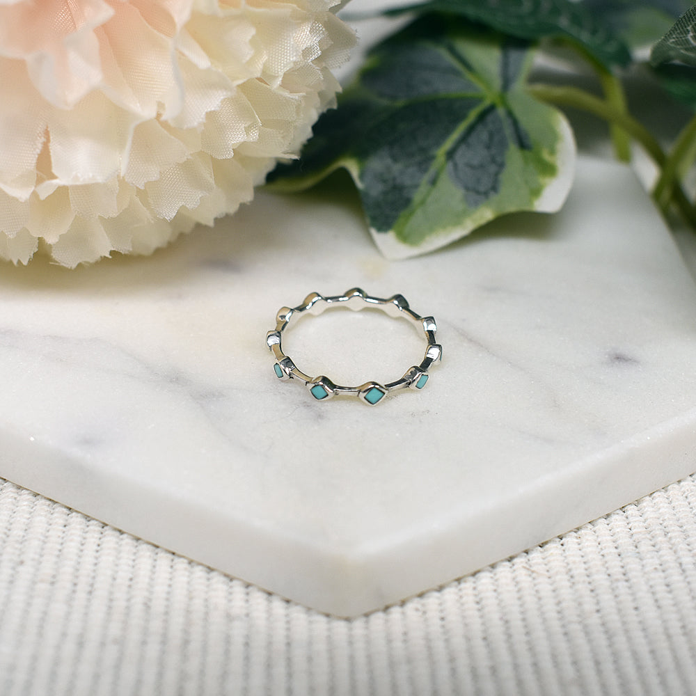 Bronwen linked round turquoise band ring