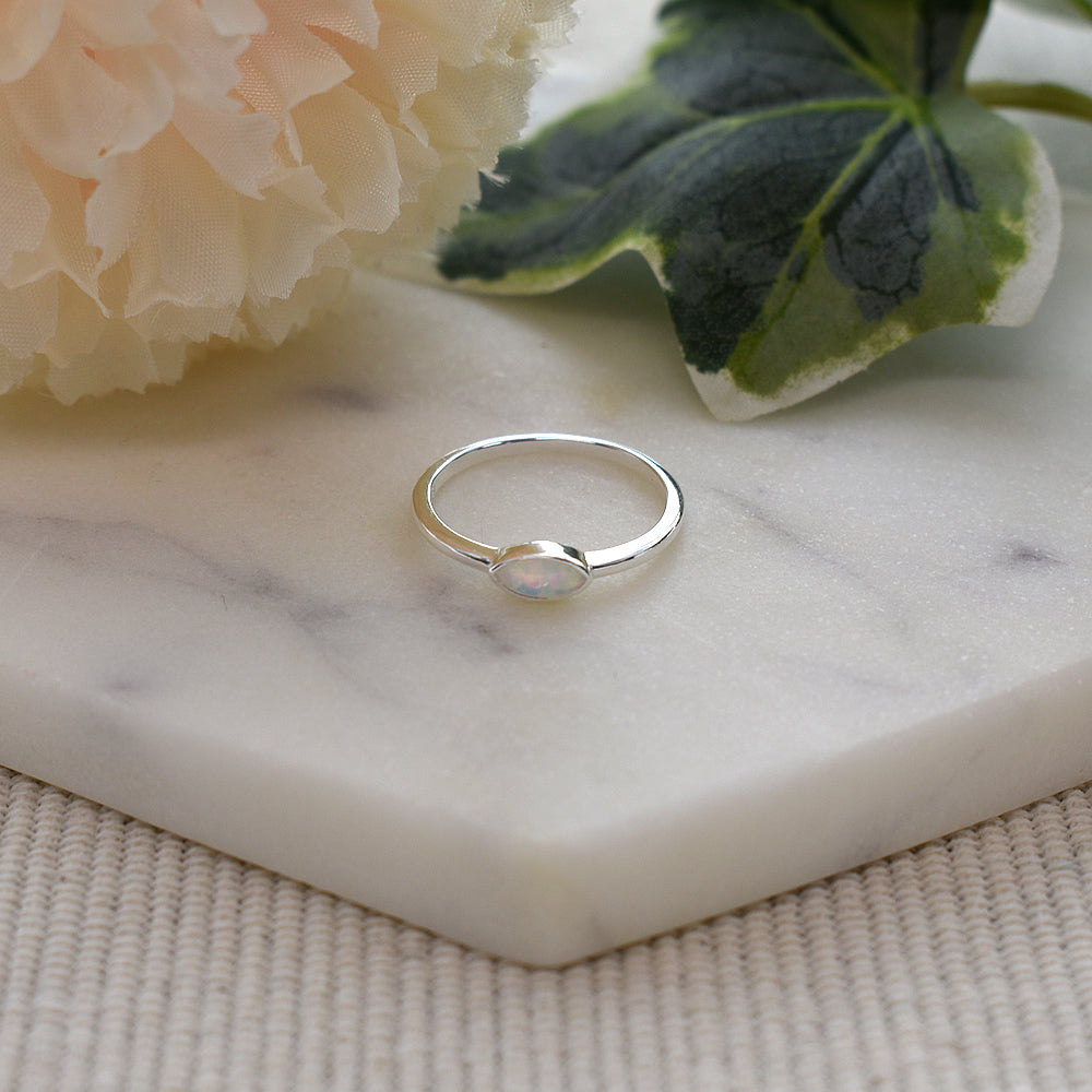 Diana horizontal set marquis white opalique ring