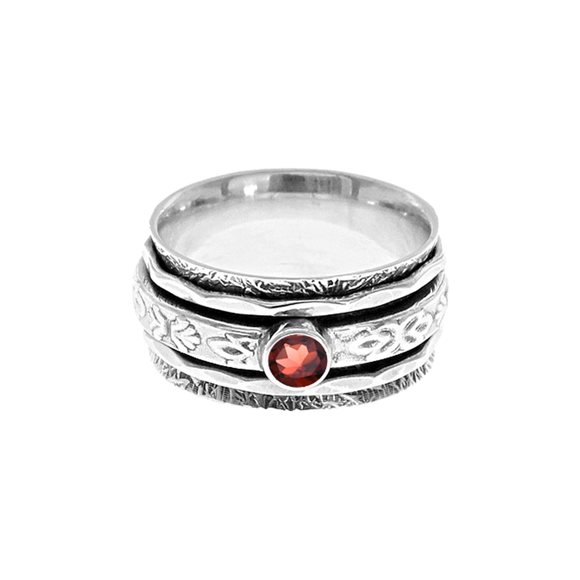 Catalina fleur de lys spinner ring with garnet
