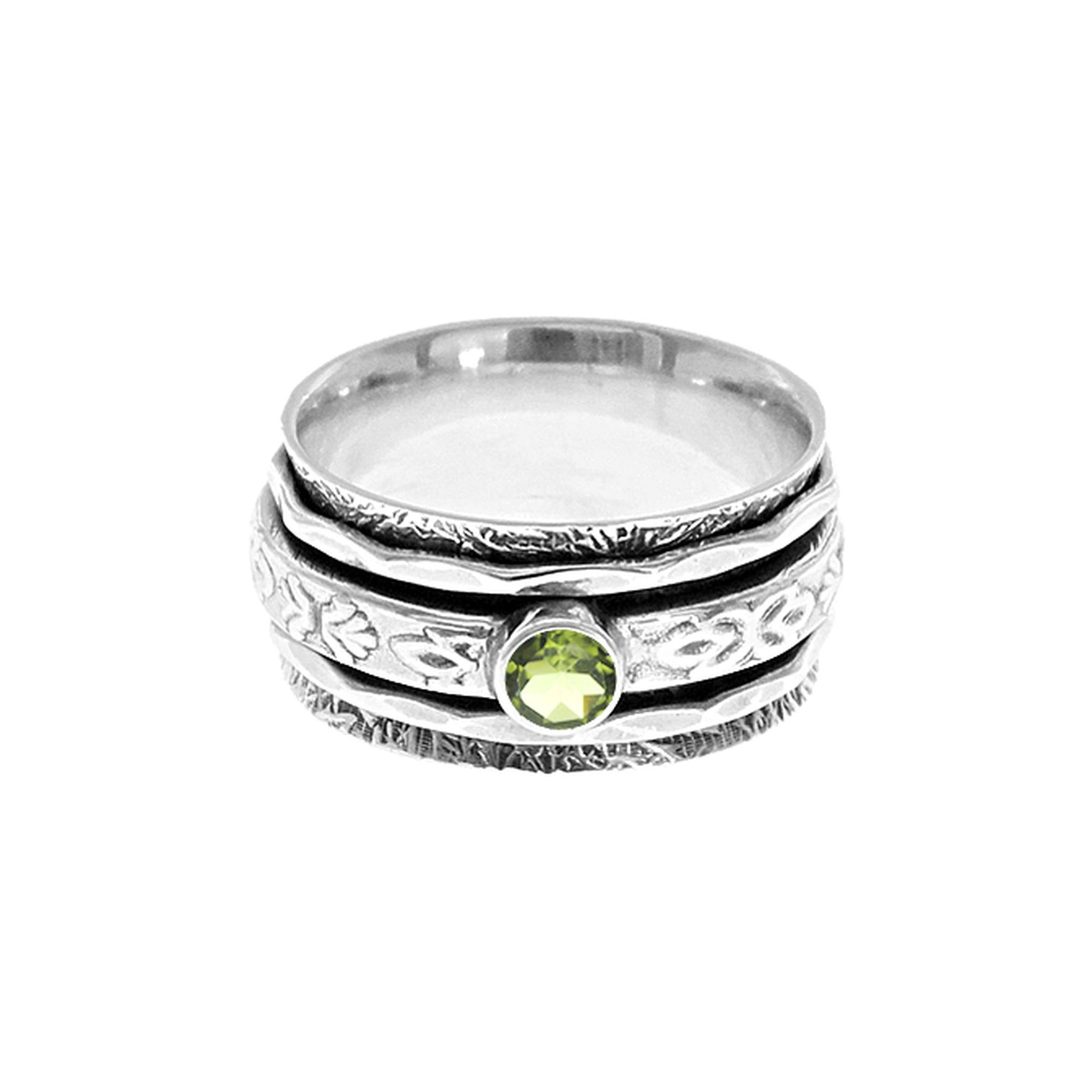 Catalina fleur de lys spinner ring with peridot