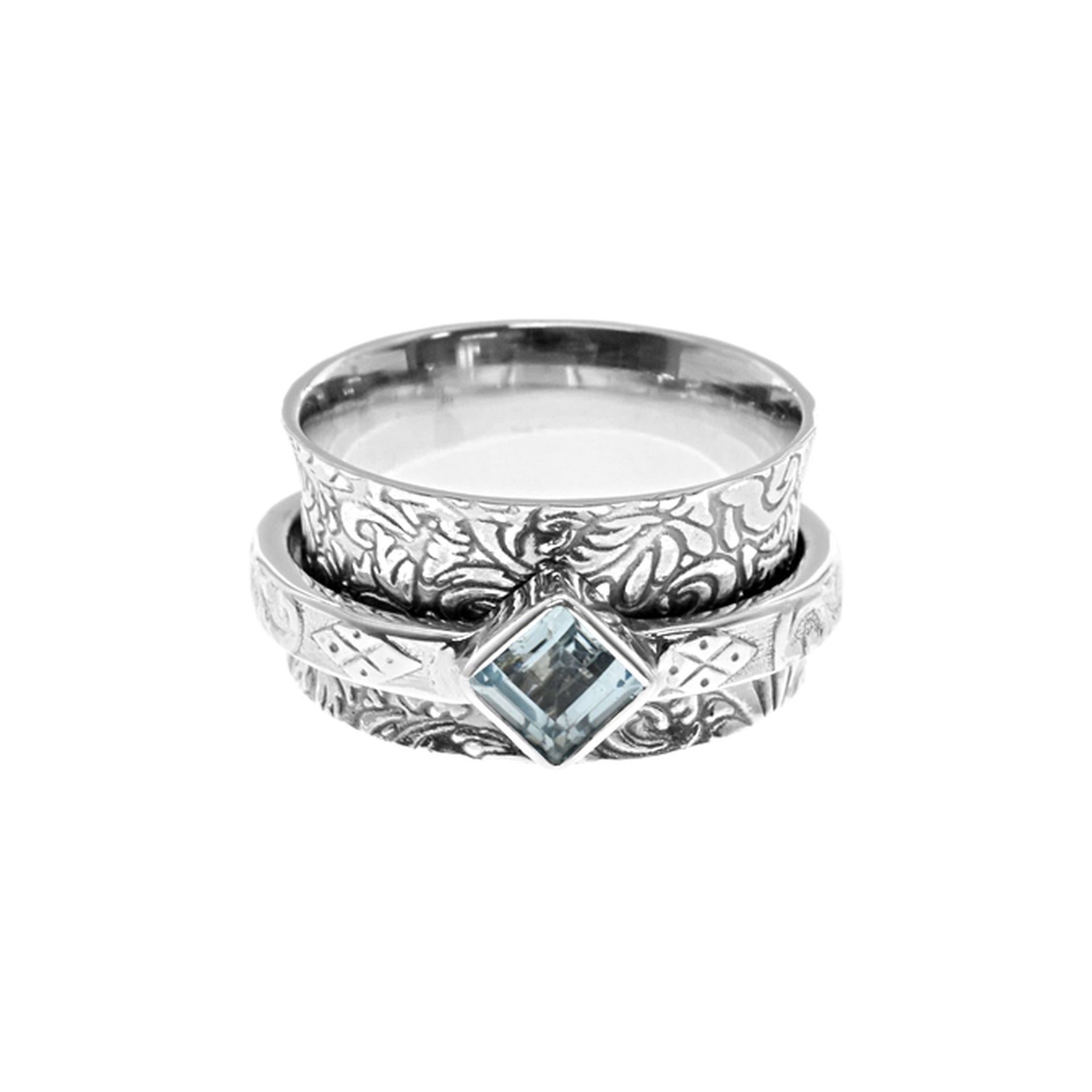 Catalina ornate spinner ring with blue topaz