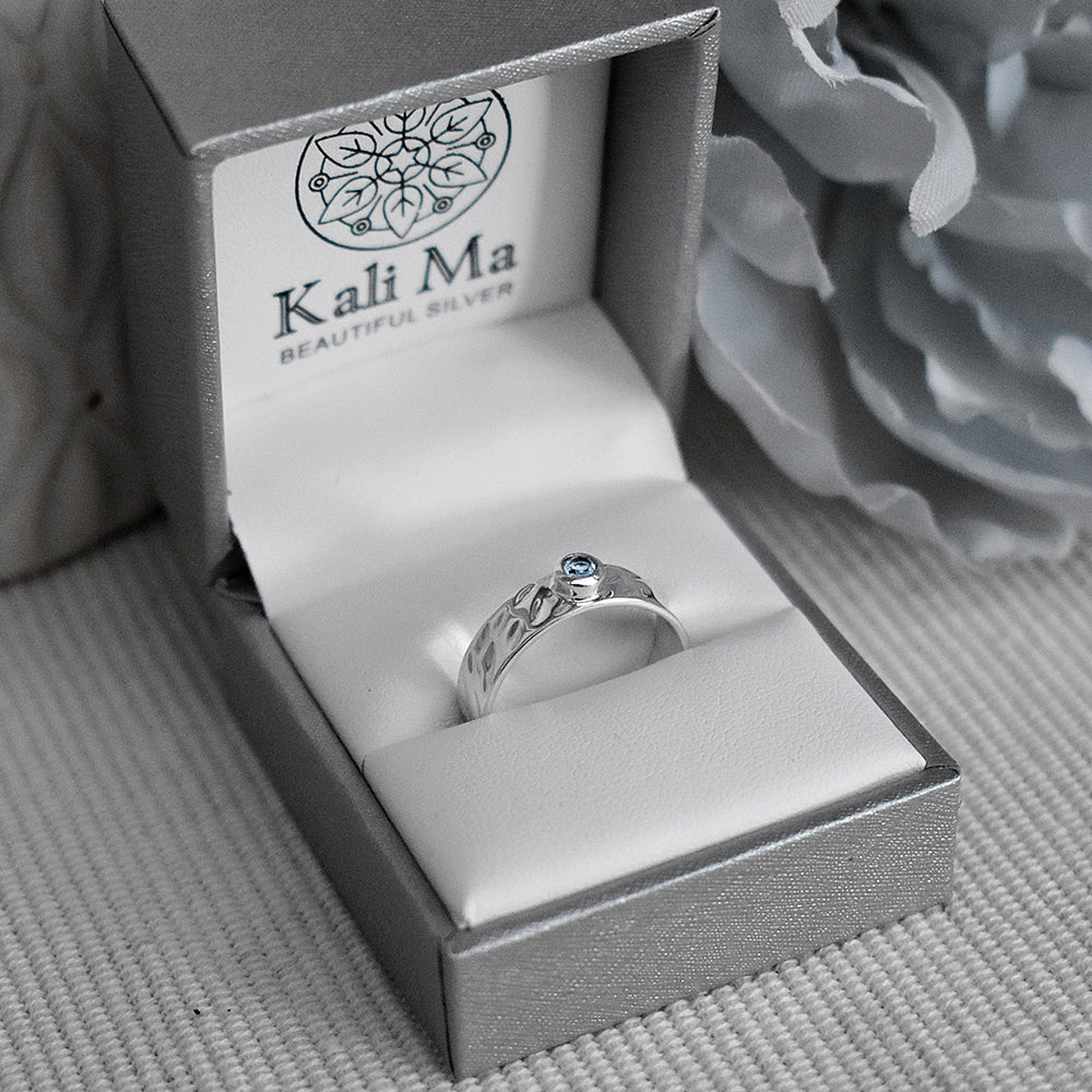 Lexi blue topaz band ring