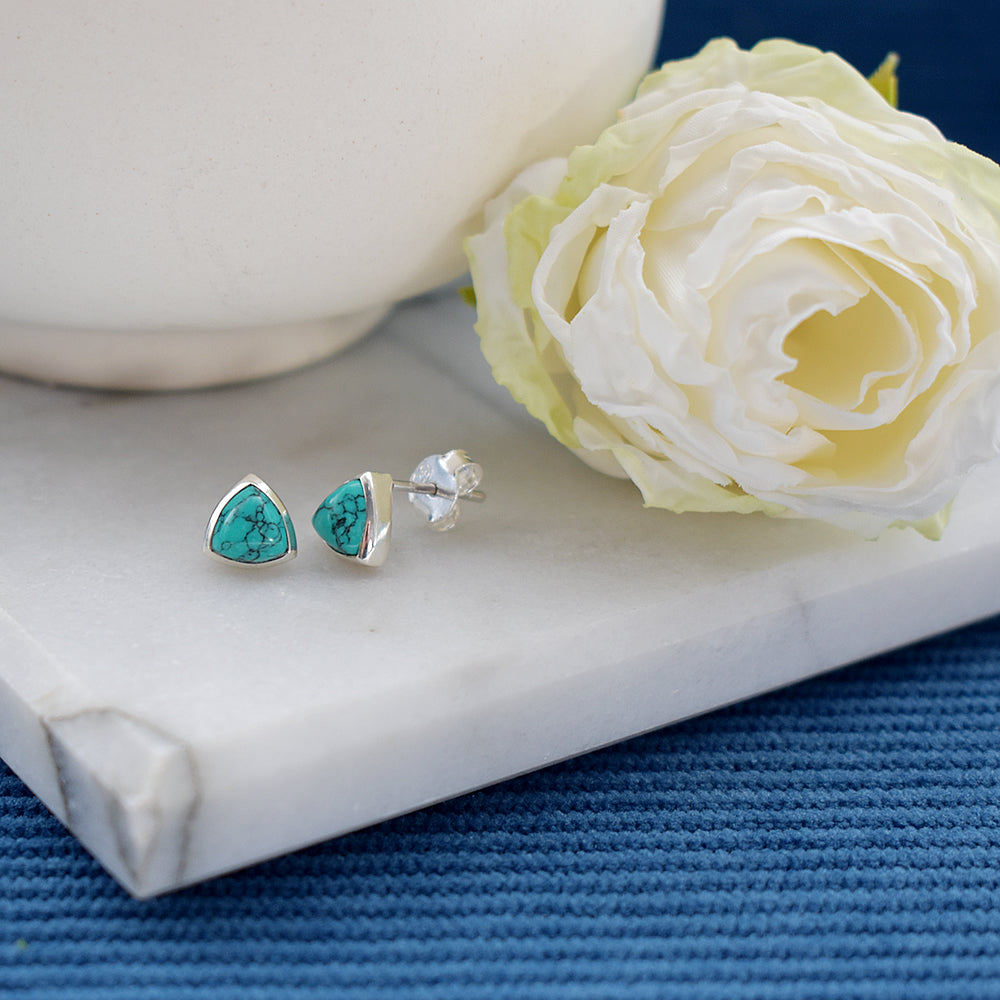 Samira trillion cut turquoise studs